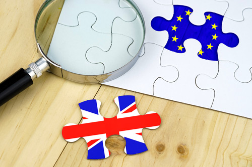 Jigsaw pieces with British and EU flags